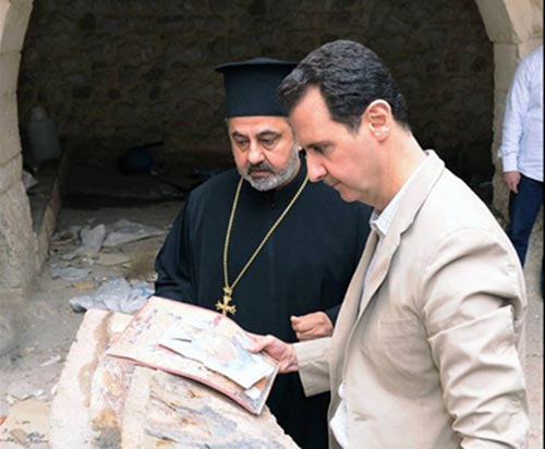 بشار الاسد يزور معلولا ويهنئ المسيحيين بعيد الفصح