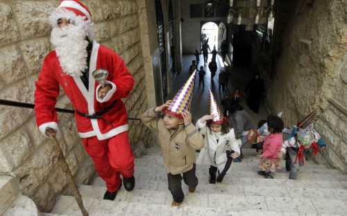 صور احتفالات عيد الميلاد من حول العالم