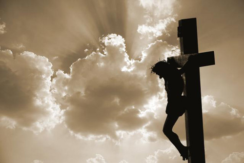 صورة  ترمز ليسوع  وهو على الصليب