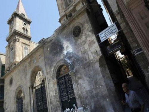 قاذفات صاروخية تطال اقدم الكنائس في حلب - سوريا