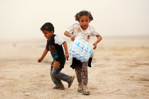 اطفال العراق اللاجئين