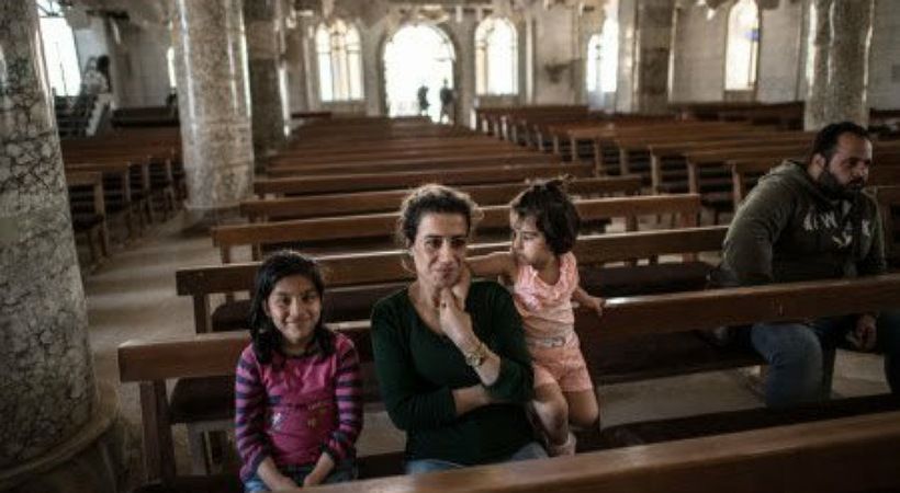 قائد مسيحي يحذر من أن الاضطهاد قد يكون اسوأ إذا انسحب بايدن من العراق