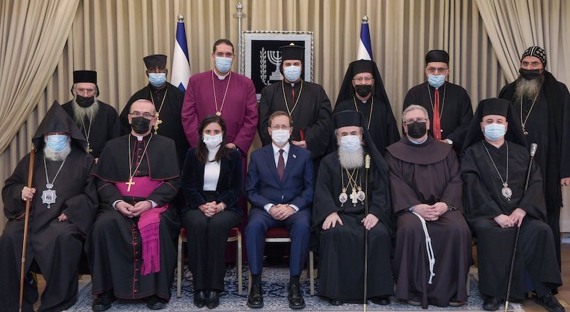 الرئيس الاسرائيلي يستضيف ممثلي الطوائف المسيحية في منزله بمناسبة العيد
